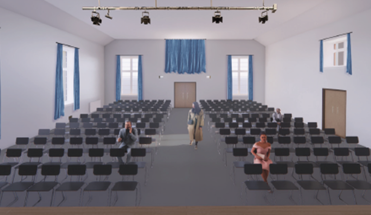 An image depicting the upgraded main hall of the renovated Campsie Memorial Hall set out with rows of chairs for a concert. 