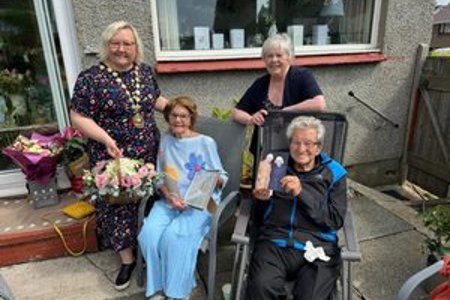 Left to right are Provost Renwick, Elvira, DL Anne Wlaker and Joe in the couple’s garden