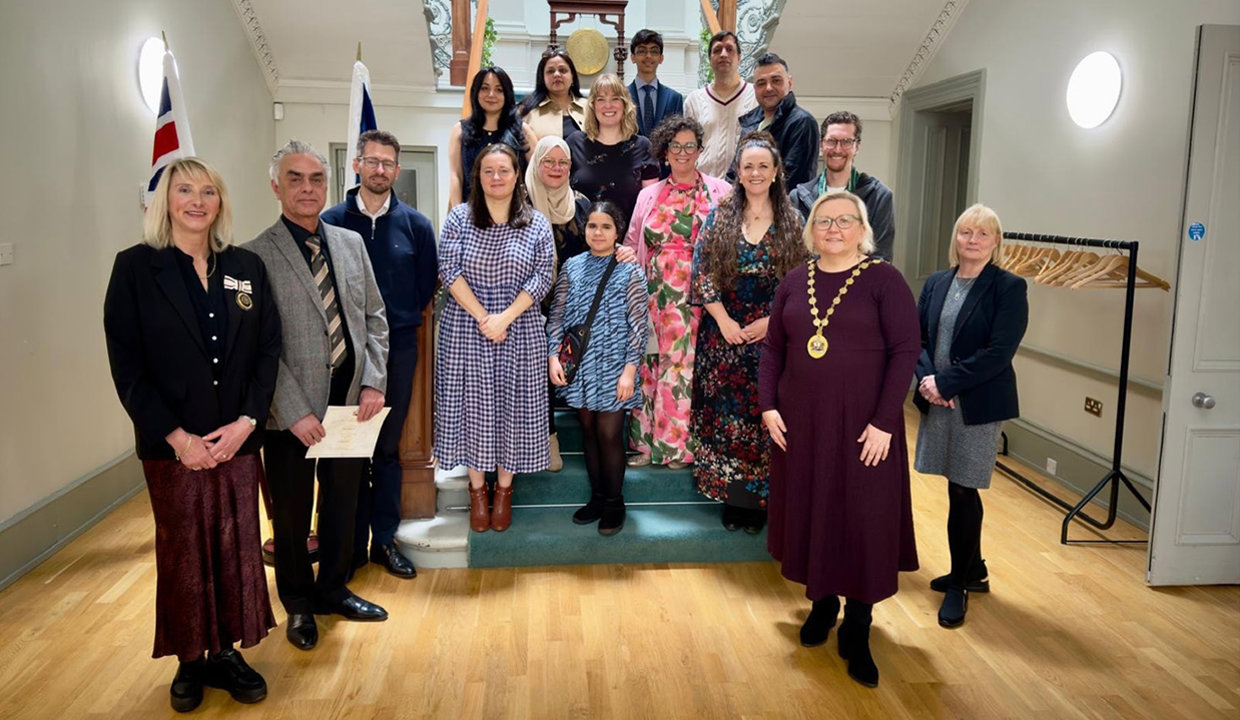 Provost Gillian Renwick and Deputy Lord Lieutenant Margaret Stewart standing with the new citizens