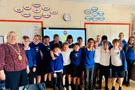 Provost Renwick is pictured with P7 pupils from Colqhoun Park Primary School.