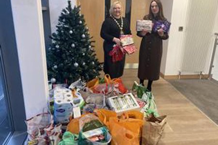 Provost Renwick and Depute Provost McDiarmid with bags of food 