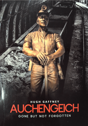 : A golden statue depicting a miner against a background showing wagons of coal moving along a rail inside a mine shaft. Wording across the image reads Hugh Gaffney Auchengeich Gone but not Forgotten.