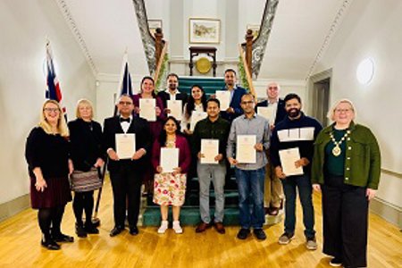Provost with new citizens at Kilmardinny House