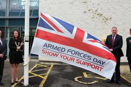 Pictured - with the Armed Forces Day flag - Vice Lord-Lieutenant Jim Rogers, Depute Provost Colette McDiarmid, Councillor Stewart MacDonald and local veteran Robert Campbell MBE.