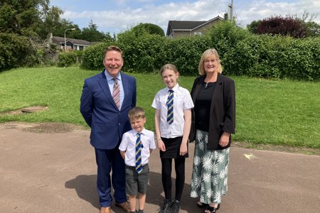 Chief Education Officer, Greg Bremner and Councillor Lynda Williamson pictured with pupils from Mosshead Primary School during a recent visit to celebrate both the school and the Education Service’s recent glowing inspection reports.