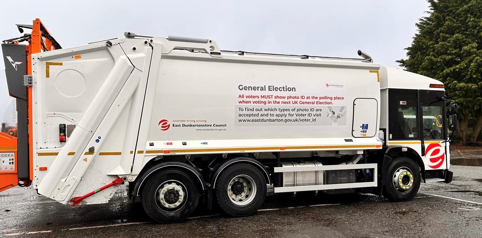 recycling truck with general election info displayed on it