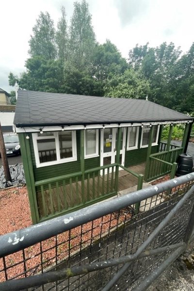 35 mugdock road green exterior with white windows and a mental fence in form