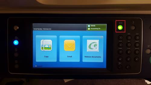 printer with the green light button highlighted red