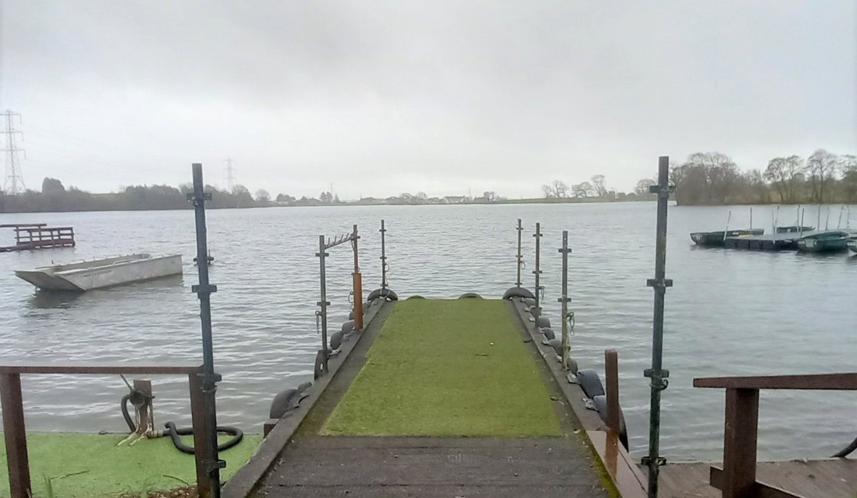 Antermony Loch perr on a cloudy day
