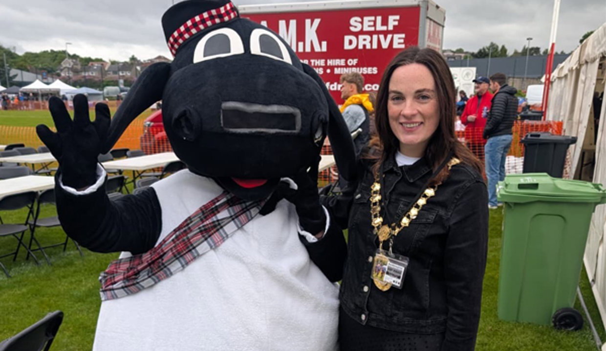 Depute Provost McDiarmid with the Highland Games mascot