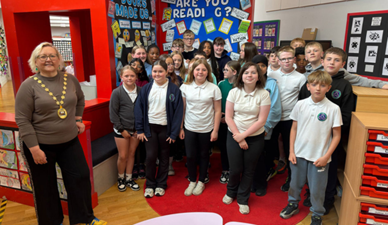 Provost Renwick pictured with pupils from Holy Trinity Primary